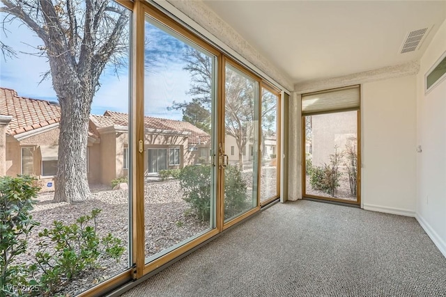 2520 Palmridge Dr, Las Vegas, NV 89134 - unfurnished sunroom with carpet flooring and baseboards