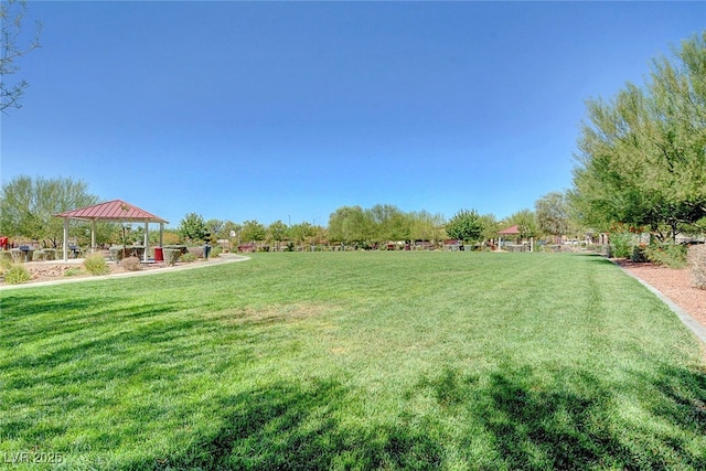 view of green lawn with a gazebo