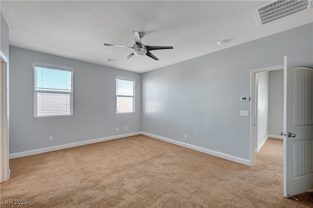 unfurnished bedroom with carpet floors, baseboards, and a ceiling fan