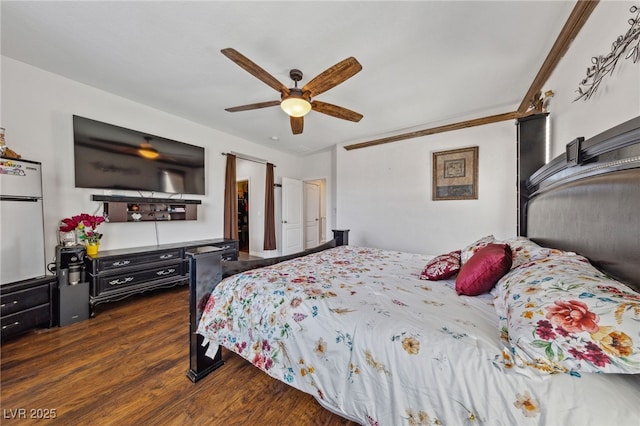 bedroom with wood finished floors and a ceiling fan