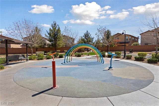 surrounding community with fence and a residential view