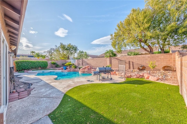 view of swimming pool featuring a patio area and grilling area