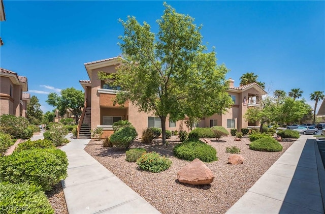 1050 E Cactus Ave Unit 1128, Las Vegas, NV 89183 - view of building exterior featuring stairway