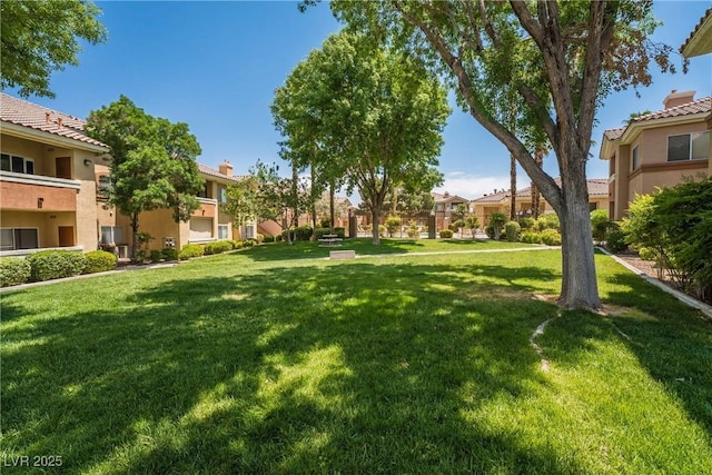 1050 E Cactus Ave Unit 1128, Las Vegas, NV 89183 - view of home's community featuring a residential view and a yard