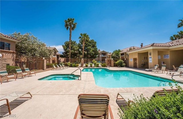 1050 E Cactus Ave Unit 1128, Las Vegas, NV 89183 - community pool featuring fence, a patio area, and a hot tub