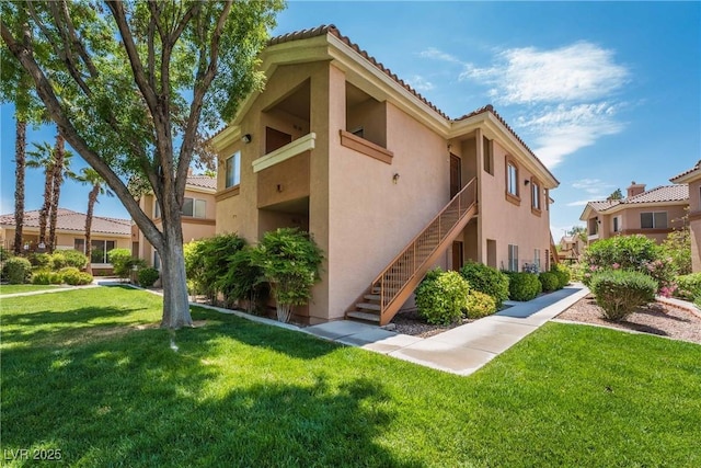 1050 E Cactus Ave Unit 1128, Las Vegas, NV 89183 - view of property featuring stairway