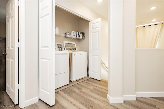 8717 Early Horizon Dr, Las Vegas, NV 89178 - laundry room with light wood-style floors, washing machine and dryer, baseboards, and recessed lighting