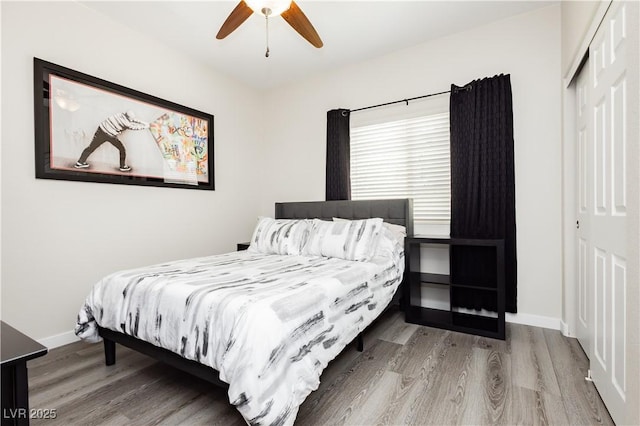 8717 Early Horizon Dr, Las Vegas, NV 89178 - bedroom with wood finished floors, a closet, baseboards, and a ceiling fan