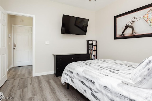 8717 Early Horizon Dr, Las Vegas, NV 89178 - bedroom featuring wood finished floors and baseboards