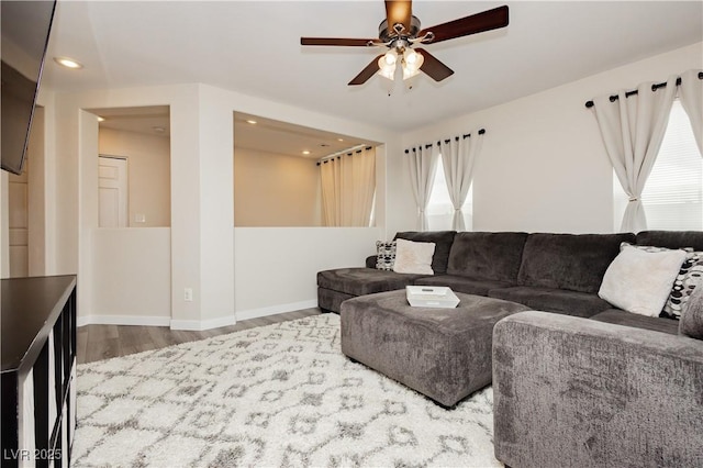 8717 Early Horizon Dr, Las Vegas, NV 89178 - living room with wood finished floors, ceiling fan, baseboards, and recessed lighting