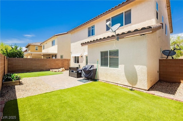 8717 Early Horizon Dr, Las Vegas, NV 89178 - rear view of house featuring a patio, stucco siding, and a tiled roof