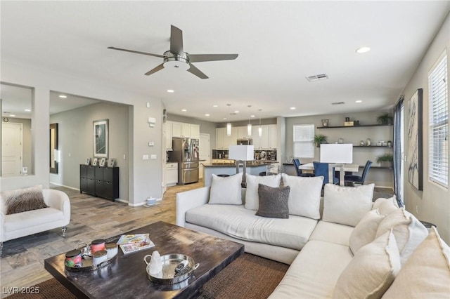 334 E Neal Ave, Las Vegas, NV 89183 - living area with ceiling fan, healthy amount of natural light, recessed lighting, baseboards, and light wood-type flooring