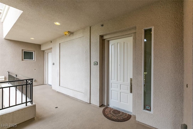 9201 Tesoras Dr Unit 302, Las Vegas, NV 89144 - entrance to property featuring a balcony and stucco siding