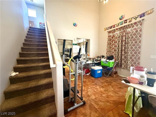 stairs with tile patterned flooring