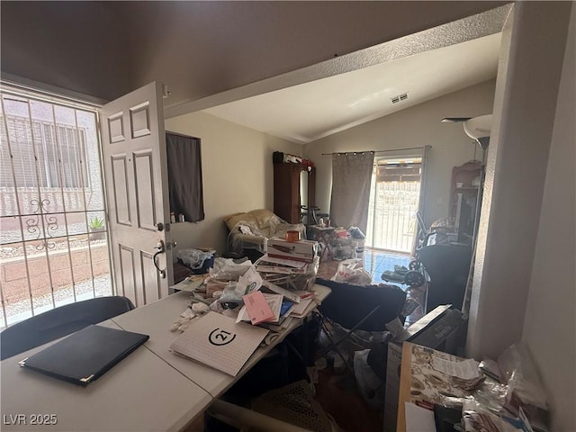 office space featuring lofted ceiling