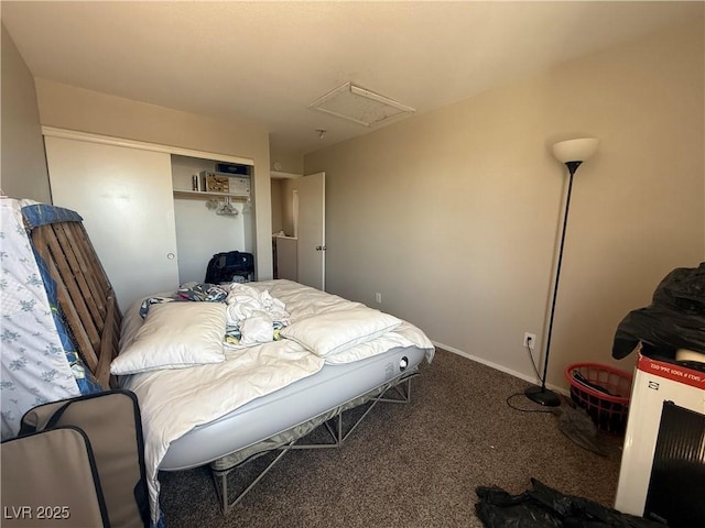 bedroom with carpet floors and a closet