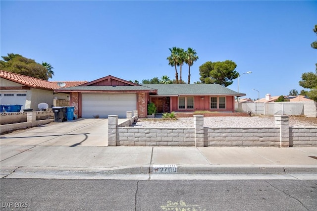 2700 Osborne Ln, Henderson, NV 89014 - ranch-style house with an attached garage and driveway