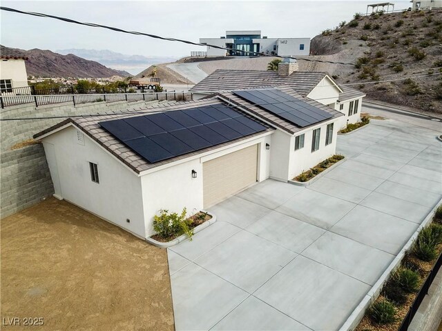 1409 Denver St, Boulder City, NV 89005 - aerial view of property and surrounding area with a mountainous background