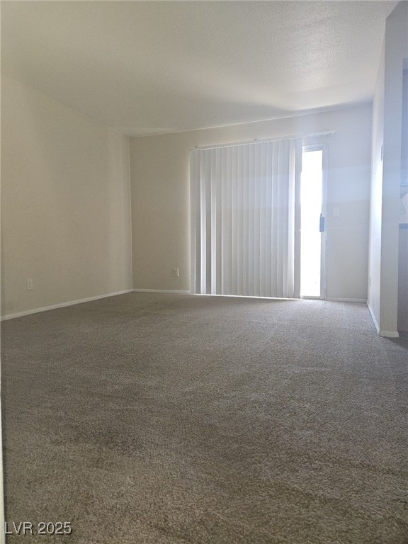 7300 Pirates Cove Rd Unit 2025, Las Vegas, NV 89145 - carpeted spare room featuring baseboards