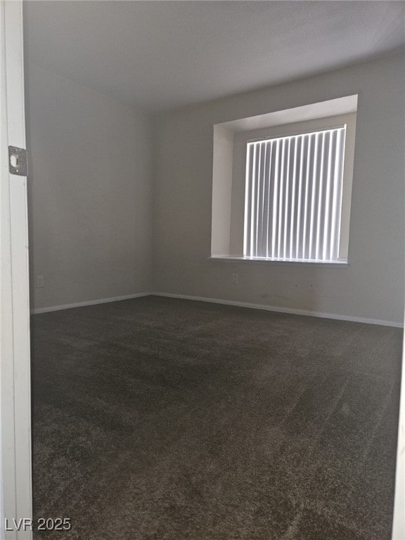 7300 Pirates Cove Rd Unit 2025, Las Vegas, NV 89145 - carpeted empty room featuring baseboards