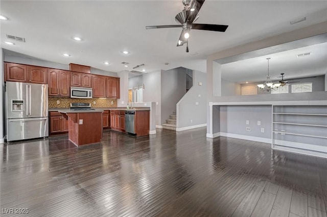484 Merseyside Dr, Las Vegas, NV 89178 - kitchen with appliances with stainless steel finishes, baseboards, open floor plan, and recessed lighting