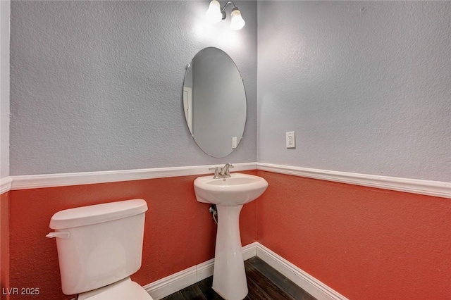 484 Merseyside Dr, Las Vegas, NV 89178 - half bath with toilet, wood finished floors, and a sink