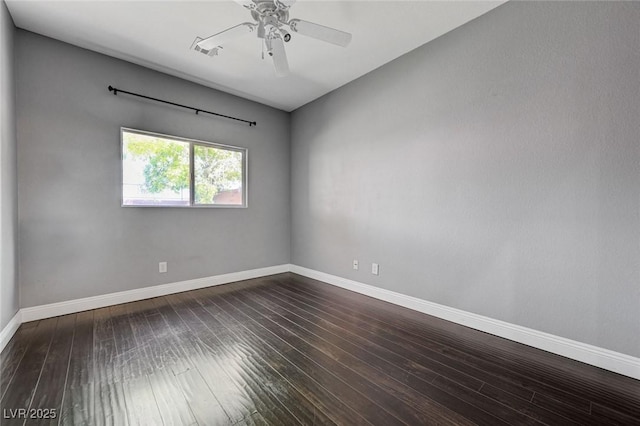484 Merseyside Dr, Las Vegas, NV 89178 - unfurnished room with baseboards, dark wood finished floors, and a ceiling fan