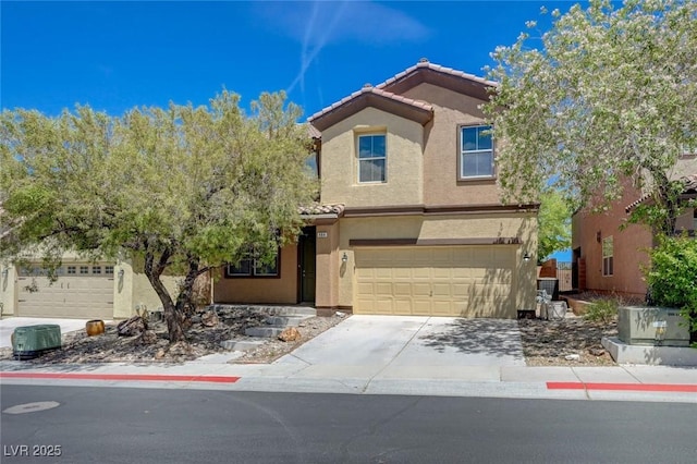 484 Merseyside Dr, Las Vegas, NV 89178 - view of front of property featuring stucco siding, a tile roof, a garage, and concrete driveway