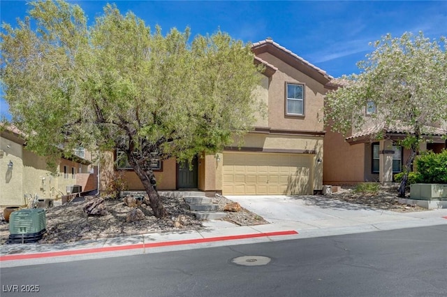 484 Merseyside Dr, Las Vegas, NV 89178 - view of front of property featuring a garage, stucco siding, driveway, a tiled roof, and central AC