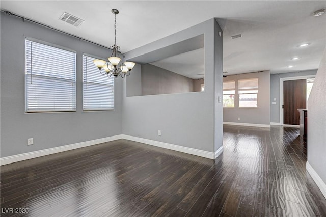 484 Merseyside Dr, Las Vegas, NV 89178 - empty room with a chandelier, baseboards, wood finished floors, and recessed lighting