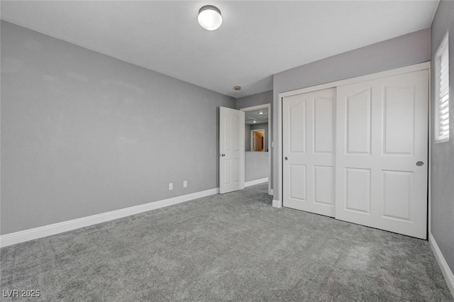484 Merseyside Dr, Las Vegas, NV 89178 - unfurnished bedroom with carpet, baseboards, and a closet