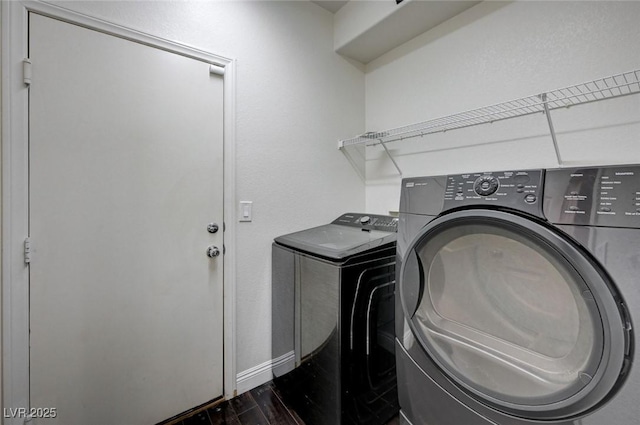 484 Merseyside Dr, Las Vegas, NV 89178 - washroom with independent washer and dryer, baseboards, and dark wood finished floors