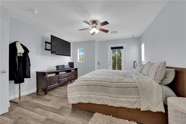 9141 Careful Canvas Ave, Las Vegas, NV 89149 - bedroom featuring access to outside, light wood-style floors, baseboards, and a ceiling fan