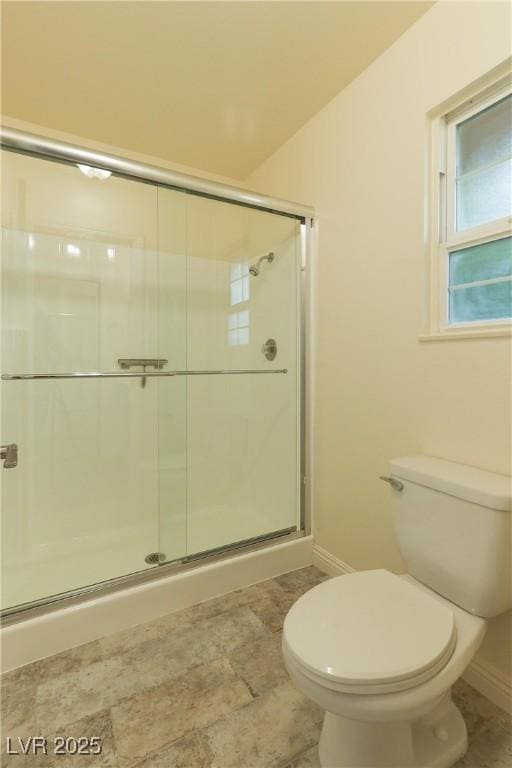 1440 Rawhide Rd, Boulder City, NV 89005 - bathroom featuring baseboards, toilet, and a shower stall