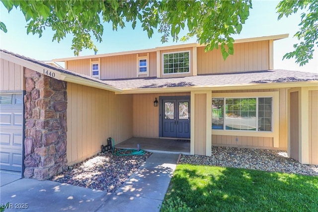 1440 Rawhide Rd, Boulder City, NV 89005 - view of exterior entry with a shingled roof