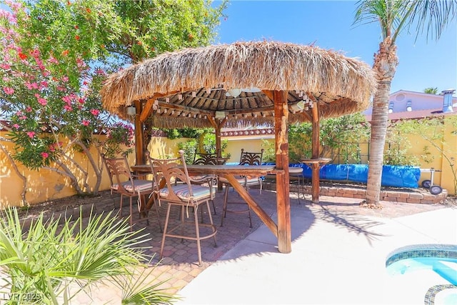 1440 Rawhide Rd, Boulder City, NV 89005 - view of patio / terrace featuring a gazebo, a fenced backyard, and outdoor dining area