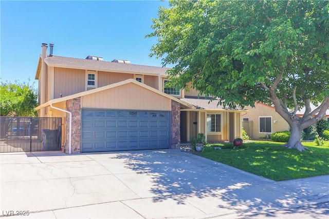 1440 Rawhide Rd, Boulder City, NV 89005 - view of front facade featuring an attached garage, concrete driveway, and stone siding