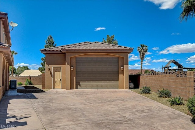 1182 Thomas Bay Cir, Logandale, NV 89021 - garage with fence and concrete driveway