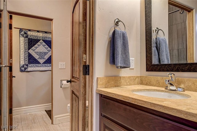 1182 Thomas Bay Cir, Logandale, NV 89021 - full bath featuring vanity, toilet, and baseboards