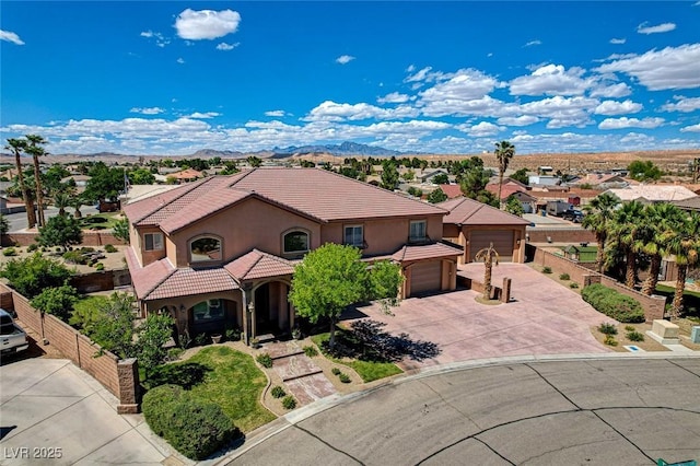 1182 Thomas Bay Cir, Logandale, NV 89021 - aerial perspective of suburban area with a mountain backdrop