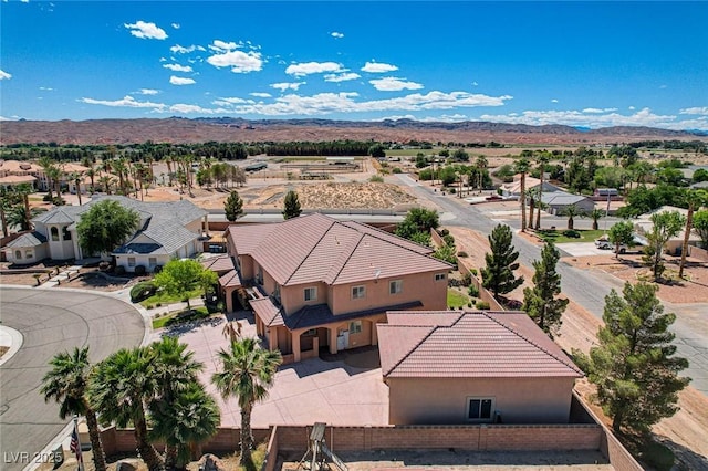 1182 Thomas Bay Cir, Logandale, NV 89021 - aerial perspective of suburban area with a mountain backdrop