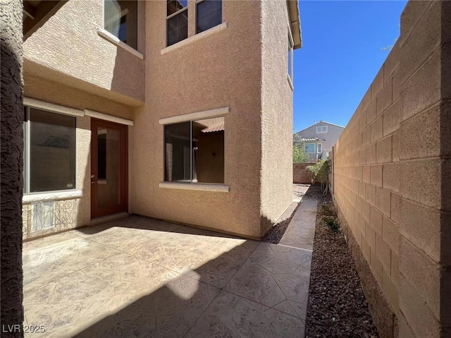 view of patio / terrace with fence