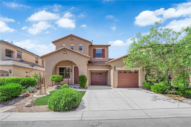 11237 Newbury Hills Ave, Las Vegas, NV 89138 - mediterranean / spanish-style home featuring stucco siding, concrete driveway, and a tiled roof