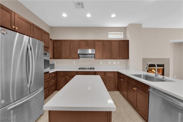 11237 Newbury Hills Ave, Las Vegas, NV 89138 - kitchen featuring appliances with stainless steel finishes, extractor fan, and light countertops