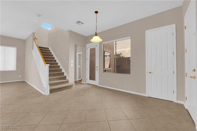11237 Newbury Hills Ave, Las Vegas, NV 89138 - entryway with stairs, plenty of natural light, and light tile patterned floors