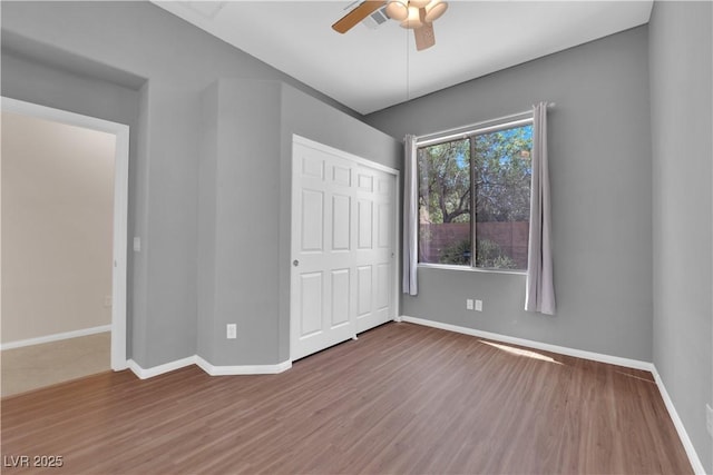 11237 Newbury Hills Ave, Las Vegas, NV 89138 - unfurnished bedroom featuring wood finished floors, a closet, and a ceiling fan
