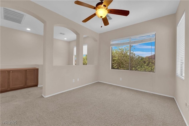 11237 Newbury Hills Ave, Las Vegas, NV 89138 - spare room with light colored carpet, plenty of natural light, and a ceiling fan