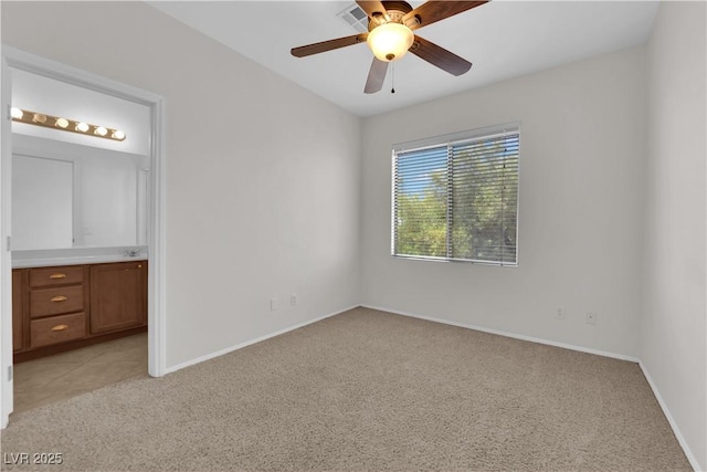 11237 Newbury Hills Ave, Las Vegas, NV 89138 - unfurnished bedroom with light colored carpet, ensuite bath, and a ceiling fan