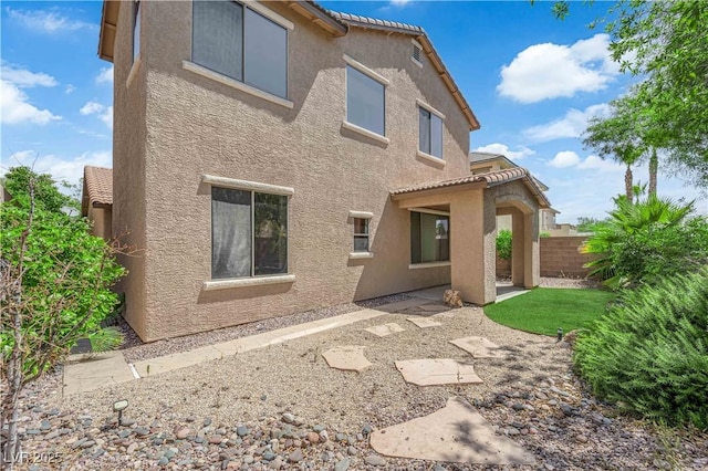 11237 Newbury Hills Ave, Las Vegas, NV 89138 - back of property with stucco siding, a patio, and a tile roof