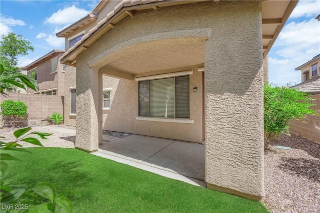 11237 Newbury Hills Ave, Las Vegas, NV 89138 - rear view of house with a patio area, stucco siding, and a fenced backyard